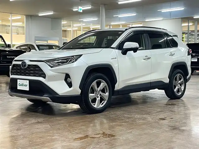 トヨタ ＲＡＶ４ ハイブリッドG 道央・札幌 2020(令2)年 9.5万km ホワイトパールクリスタルシャイン 4WD/ワンオーナー/寒冷地仕様/純正9型ナビ/フルセグTV/CD/DVD/Bluetooth/SD/バックカメラ/黒革/パワーシート（D）/シートメモリ/シートヒーター（D/N）/ステアリングヒーター/セーフティセンス/・衝突軽減ブレーキ/・レーンキープアシスト/・横滑り防止/レーダークルーズコントロール/パワーバックドア/ブラインドスポットモニター/フロントワイパーデアイサー/オートマチックハイビーム/ドライブレコーダー（前方）/スマートキー×2/純正エンジンスターター/AC100V電源/社外17インチAW付スタッドレス積み込み/・225/65/17　BS：2024年製　6mm/保証書/取扱説明書
