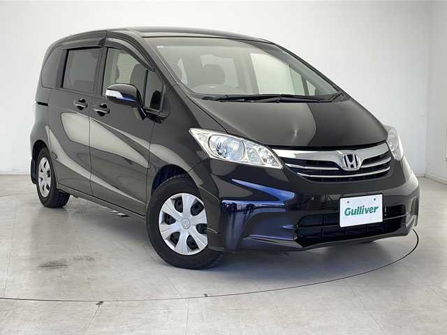 ホンダ フリード G ジャストセレクション 千葉県 2013(平25)年 5.4万km プレミアムブラキッシュパール クルーズコントロール/横滑り防止装置/社外7インチSDナビ（CN-S310D）/　（Bluetooth/CD/DVD/フルセグTV）/純正ETC/3列シート/両側パワースライドドア/純正フロアマット/パワーステアリング/オートライト/キセノンヘッドライト
