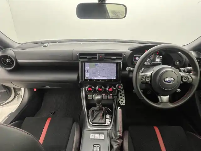 スバル ＢＲＺ S 群馬県 2022(令4)年 1.5万km クリスタルホワイトP STIフロントアンダースポイラー/STIリヤアンダーディフューザー/＝＝＝＝＝/純正9インチメモリナビ/・CD TV BT AM FM DVD USB/=====/ＳＴＩエアロ　純正９インチナビ　バックカメラ　シートヒーター　パドルシフト　アイサイトコアテクノロジー　ブラインドスポットモニター　レーンキープアシスト　全車速追従機能付クルーズコントロール　禁煙車