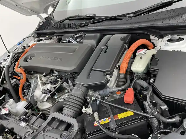 ホンダ シビック e:HEV 宮城県 2023(令5)年 2.4万km プラチナホワイトパール 純正コネクトナビ/リアスポイラー/LEDフォグライト/BOSEサウンド/アダプティブクルーズコントロール/トラフィックジャムアシスト/アダプティブドライビングビーム/BSM/パーキングセンサー/ホンダセンシング/前席パワーシート/シートヒーター/ワイヤレス充電器/コンビシート/ETC2.0/前後ドライブレコーダー/禁煙
