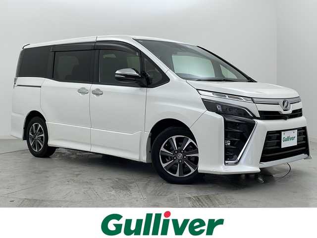 トヨタ ヴォクシー ZS 煌Ⅱ 宮城県 2019(令1)年 6.9万km ホワイトパールクリスタルシャイン ワンオーナー/トヨタセーフティーセンス/・クルーズコントロール/・プリクラッシュセーフティ/・レーンディパーチャーアラート/・先行車発進告知/アルパインフリップダウンモニター/アルパイン11インチナビ/・フルセグTV/・BT.CD/DVD.HDMI.USB/バックカメラ/両側パワースライドドア/LEDヘッドライト/LEDフォグライト/ビルトインETC/革巻きステアリング/ステアリングスイッチ/プッシュスタート/スマートキー/アイドリングストップ/純正16インチアルミホイール/ドアバイザー