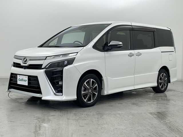 トヨタ ヴォクシー ZS 煌Ⅱ 宮城県 2019(令1)年 6.9万km ホワイトパールクリスタルシャイン ワンオーナー/トヨタセーフティーセンス/・クルーズコントロール/・プリクラッシュセーフティ/・レーンディパーチャーアラート/・先行車発進告知/アルパインフリップダウンモニター/アルパイン11インチナビ/・フルセグTV/・BT.CD/DVD.HDMI.USB/バックカメラ/両側パワースライドドア/LEDヘッドライト/LEDフォグライト/ビルトインETC/革巻きステアリング/ステアリングスイッチ/プッシュスタート/スマートキー/アイドリングストップ/純正16インチアルミホイール/ドアバイザー