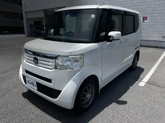 ホンダ Ｎ ＢＯＸ G Lパッケージ 岡山県 2014(平26)年 12.8万km プレミアムホワイトパール (株)IDOMが運営する【じしゃロン岡山店】の自社ローン専用車両になります。こちらは現金またはオートローンご利用時の価格です。自社ローンご希望の方は別途その旨お申付け下さい/純正7インチナビ/Bluetooth/バックカメラ/ワンセグテレビ/CD/DVD/プッシュスタート/ステアリングスイッチ/片側パワスラ/純正フロアマット/社外14インチAW