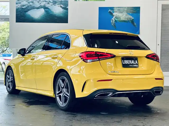 メルセデス・ベンツ Ａ２００ｄ AMGライン 大阪府 2020(令2)年 5.6万km サンイエロー レーダーセーフティP/赤黒革/メモリ付きパワーシート/シートヒーター/純正ナビ/TV/バックカメラ/ACC/純正18インチAW/LEDヘッドライト/アンビエントライト/ブラインドスポット/ワイヤレス充電
