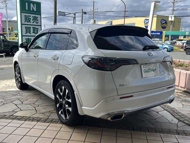 ホンダ ＺＲ－Ｖ ハイブリッド e:HEV Z 静岡県 2023(令5)年 1.9万km プラチナホワイトパール 純正ディスプレイオーディオ/・Bluetooth/・フルセグＴＶ/・ＵＳＢ/・スマホ連携/主要装備/・BOSEプレミアムサウンド/・衝突軽減/・レーンキープ/・追従クルコン/・コーナーセンサー前後/・全方位カメラ/・BSM/・パワーバックドア/・ワイヤレス充電/・ETC2.0/・レザーシート/・パワーシート/・シートヒーター/・ハンドルヒーター/・純正フロアマット/・純正アルミホイール