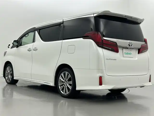 トヨタ アルファード S タイプゴールド 熊本県 2021(令3)年 3.9万km ホワイトパールクリスタルシャイン サンルーフ　/純正ナビ（ＣＤ・ＤＶＤ・フルセグ・ＢＴ）/純正12.1型フリップダウンモニター/バックカメラ　/ビルトインＥＴＣ　/両側パワースライドドア　/前後クリアランスソナー　/パワーバックドア　/デジタルインナーミラー　/トヨタセーフティーセンス/・プリクラッシュセーフティ/・レーンキープアシスト/・ブラインドスポットモニター/・リアクロストラフィックアラート/・駐車時支援パーキングサポートシステム/・ロードサインアシスト/・アダブティブクルーズコントロール/・オートハイビーム/横滑り防止/電動パーキングブレーキ/ブレーキホールド/ハーフレザーシート/社外フロアマット/純正１８インチAW/オートライト/LEDヘッドライト/フォグライト/スマートキー/プッシュスタート/保証書/取扱説明書