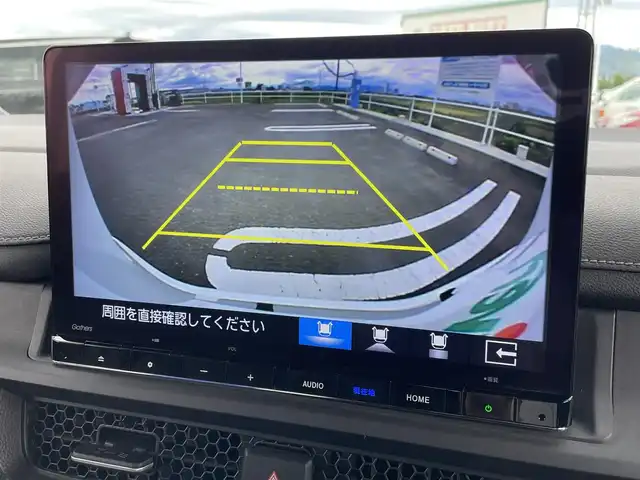 ホンダ ステップワゴン スパーダ eHEV 熊本県 2022(令4)年 3万km プラチナホワイトパール 純正11.4インチメモリーナビゲーション/・フルセグTV/CD/DVD/SD/Bluetooth/純正フリップダウンモニター/バックカメラ/前後ドライブレコーダー/ビルトインETC/両側パワースライドドア/電子パーキングブレーキ/BRAKE HOLD機能/パワーテールゲート/後席エアコン/ハーフレザーシート/DN席シートヒーター/2列目オットマン/後席サンシェード/ISOFIX対応/パドルシフト/革巻きステアリング/ステアリングリモコン/純正16インチアルミホイール/純正LEDヘッドライト/・オートマチックハイビーム/純正LEDフォグランプ/純正フロアマット/純正ドアバイザ―/新車保証書/スペアキー１本/ホンダセンシング/・アダプティブクルーズコントロール/・衝突被害軽減ブレーキ/・先行車発進お知らせ機能/・路外逸脱抑制機能/・ブラインドスポットインフォメーション/・標識認識機能/・パーキングセンサーシステム
