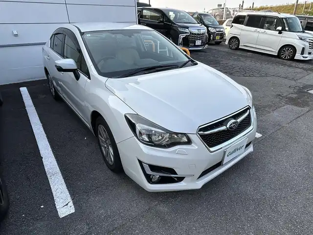 スバル インプレッサ Ｇ４ 2．0i アイサイト 長崎県 2015(平27)年 2.2万km クリスタルホワイトP ワンオーナー/社外メモリナビ/Bluetooth/ワンセグテレビ/バックカメラ/衝突軽減システム/アイドリングストップ/純正16インチAW/クルーズコントロール/パドルシフト/オートライト/ETC