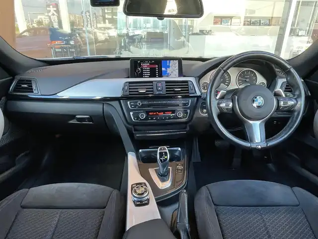 ＢＭＷ ３２０ｉ グランツーリスモ Mスポーツ 鹿児島県 2015(平27)年 8.2万km 白 禁煙車/純正ナビ/Bluetooth/CD/DVD/バックカメラ/ETC/USB入力端子/パワーシート/ドライブレコーダー/社外フロアマット/横滑り防止装置/レーンキープアシスト/オートライト/保証書/取扱説明書