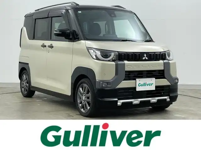 三菱 デリカミニ G プレミアム 岡山県 2024(令6)年 1.5万km ナチュラルアイボリーメタリック 純正9インチディスプレイオーディオ（AVIC-RQ720）/（Bluetooth/USB/Carplay/フルセグTV）/両側電動スライドドア/マイパイロット/デジタルインナーミラー/全方位カメラ/ステアリングヒーター/シートヒーター（運転席・助手席）/レーダークルーズコントロール/オートハイビーム/LEDヘッドライト/コーナーセンサー(前後)/ダウンヒルアシストコントロール/カーテンエアバック/社外フロアマット/純正15インチアルミ/ETC