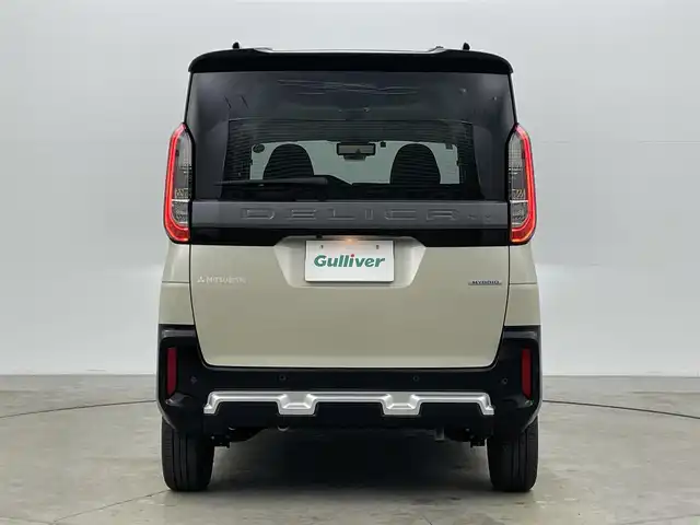 三菱 デリカミニ G プレミアム 岡山県 2024(令6)年 1.5万km ナチュラルアイボリーメタリック 純正9インチディスプレイオーディオ（AVIC-RQ720）/（Bluetooth/USB/Carplay/フルセグTV）/両側電動スライドドア/マイパイロット/デジタルインナーミラー/全方位カメラ/ステアリングヒーター/シートヒーター（運転席・助手席）/レーダークルーズコントロール/オートハイビーム/LEDヘッドライト/コーナーセンサー(前後)/ダウンヒルアシストコントロール/カーテンエアバック/社外フロアマット/純正15インチアルミ/ETC