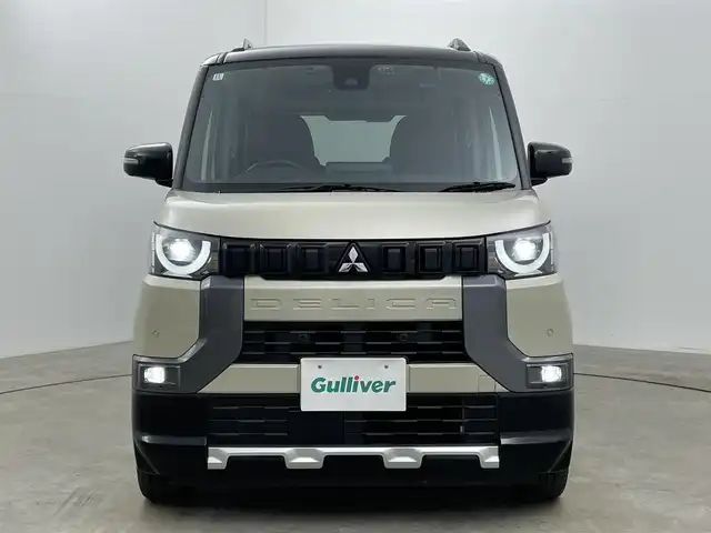 三菱 デリカミニ G プレミアム 岡山県 2024(令6)年 1.5万km ナチュラルアイボリーメタリック 純正9インチディスプレイオーディオ（AVIC-RQ720）/（Bluetooth/USB/Carplay/フルセグTV）/両側電動スライドドア/マイパイロット/デジタルインナーミラー/全方位カメラ/ステアリングヒーター/シートヒーター（運転席・助手席）/レーダークルーズコントロール/オートハイビーム/LEDヘッドライト/コーナーセンサー(前後)/ダウンヒルアシストコントロール/カーテンエアバック/社外フロアマット/純正15インチアルミ/ETC