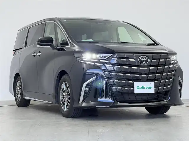 トヨタ アルファードハイブリット エグゼクティブ ラウンジ 愛知県 2023(令5)年 3.9万km ブラック 左右独立ムーンルーフ/１４インチディスプレイオーディオ　/（フルセグ／Bluetooth）　/ＪＢＬプレミアムサウンドシステム　/14インチフリップダウンモニター　/レーダークルーズコントロール　/パノラミックビューモニター　/パドルシフト/ブラインドスポットモニター/コーナーセンサー　/レザーシート（ニュートラルベージュ）　/両側パワースライドドア　/ヘッドアップディスプレイ/ユニバーサルステップ　/電動リアゲート/全席パワーシート/全席シートヒーター/全席エアーシート/メモリーシート（運転席、後席）/ハンドルヒーター/後席パワーサイドサンシェード/ワイヤレス充電/デジタルインナーミラー/ETC2.0/ドライブレコーダー/純正AW