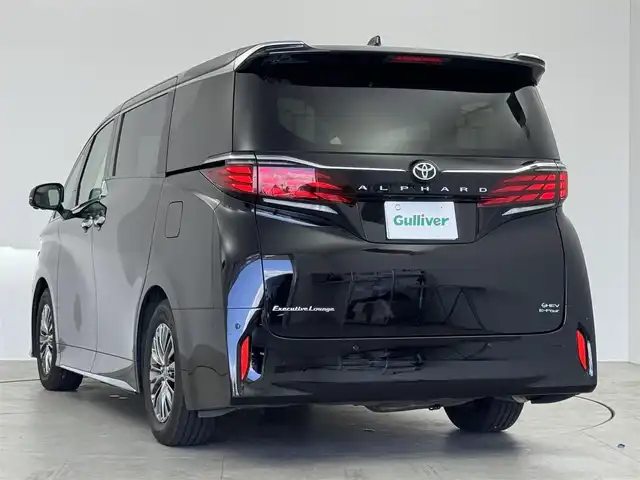 トヨタ アルファードハイブリット エグゼクティブ ラウンジ 愛知県 2023(令5)年 3.9万km ブラック 左右独立ムーンルーフ/１４インチディスプレイオーディオ　/（フルセグ／Bluetooth）　/ＪＢＬプレミアムサウンドシステム　/14インチフリップダウンモニター　/レーダークルーズコントロール　/パノラミックビューモニター　/パドルシフト/ブラインドスポットモニター/コーナーセンサー　/レザーシート（ニュートラルベージュ）　/両側パワースライドドア　/ヘッドアップディスプレイ/ユニバーサルステップ　/電動リアゲート/全席パワーシート/全席シートヒーター/全席エアーシート/メモリーシート（運転席、後席）/ハンドルヒーター/後席パワーサイドサンシェード/ワイヤレス充電/デジタルインナーミラー/ETC2.0/ドライブレコーダー/純正AW