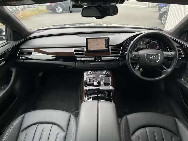 アウディ Ａ８ 3．0 TFSI クワトロ 山梨県 2015(平27)年 1.1万km 黒 純正MMIナビ/　（CD/DVD/Bluetooth/フルセグTV）/360°カメラ/SR/ACC/BSM/LKA/BOSE/黒革/シートヒーター/電動リアゲート/ETC/純正21インチAW