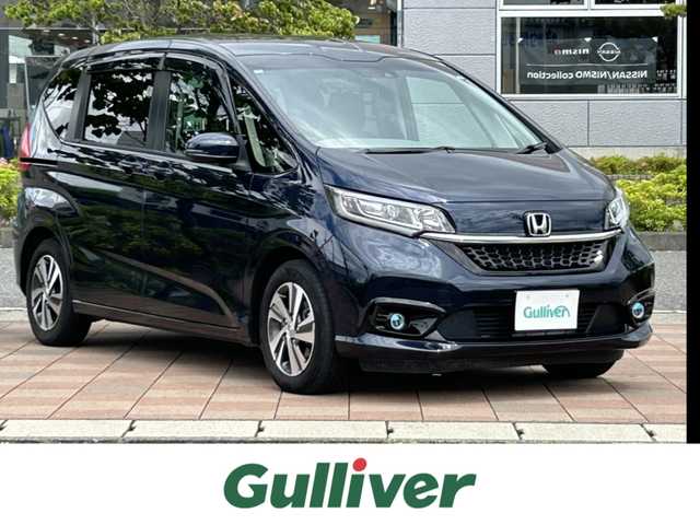 ホンダ フリード G ホンダセンシング 福島県 2020(令2)年 3.8万km ミッドナイトブルービームM ホンダセンシング/アダプティブクルーズコントロール/レーンキープアシスト/衝突被害軽減ブレーキ/純正ナビゲーション/型番：VXM-207VFNi/【CD/DVD/SD/USB/HDMI/BT/TV】/バックカメラ/ドライブレコーダー/ビルトインETC/フリップダウンモニター/両側パワースライドドア/前席シートヒーター/ステアリングリモコン/LEDオートライト/LEDフォグランプ/純正フロアマット/ドアバイザー/保証書/取扱説明書/スペアキー×１