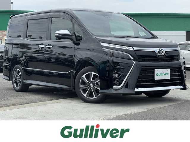 トヨタ ヴォクシー ZS 煌Ⅲ 徳島県 2021(令3)年 1.9万km ブラック 純正10型SDナビ　NSZN-Z68T/AM/FM/Bluetooth/DISC/SD/TV/バックカメラ/両側電動スライドドア/オートライト/本革巻きステアリング/クルーズコントロール/コーナーセンサー/ドライブレコーダー/ETC2.0/オートマチックハイビーム/LEDヘッドライト/純正16インチアルミホイール/ドアバイザー/純正フロアマット/パーキングサポートブレーキ/クリアランスソナー/スマートキー/プッシュスタート/ECO モード/横滑り防止装置/レーンキープアシスト