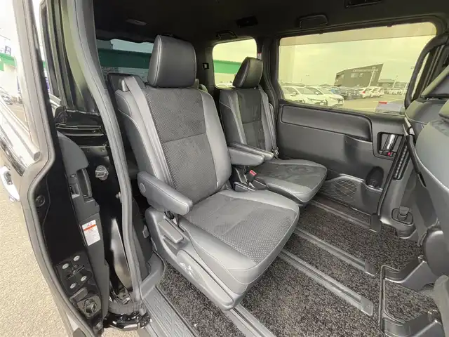 トヨタ ヴォクシー ZS 煌Ⅲ 徳島県 2021(令3)年 1.9万km ブラック 純正10型SDナビ　NSZN-Z68T/AM/FM/Bluetooth/DISC/SD/TV/バックカメラ/両側電動スライドドア/オートライト/本革巻きステアリング/クルーズコントロール/コーナーセンサー/ドライブレコーダー/ETC2.0/オートマチックハイビーム/LEDヘッドライト/純正16インチアルミホイール/ドアバイザー/純正フロアマット/パーキングサポートブレーキ/クリアランスソナー/スマートキー/プッシュスタート/ECO モード/横滑り防止装置/レーンキープアシスト