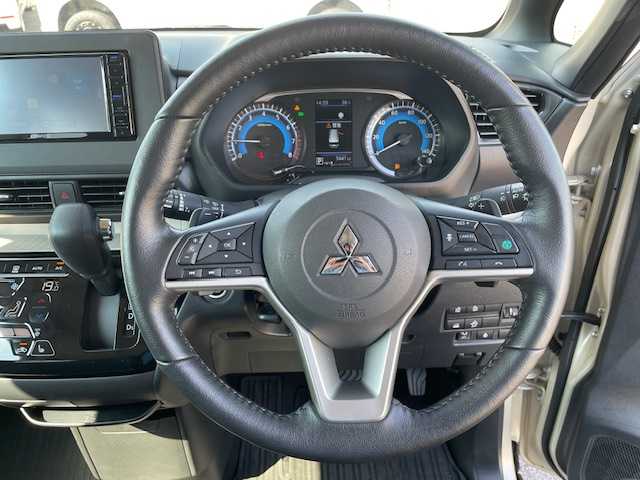 三菱 デリカミニ T プレミアム 鹿児島県 2024(令6)年 1万km ベージュⅡ 衝突軽減ブレーキ/ターボ/４ＷＤ/ナビ/全方位カメラ/ビルトインＥＴＣ/両側電動スライドドア/レーダークルーズコントロール/電動パーキングブレーキ/デジタルインナーミラー/ＬＥＤヘッドライト/プッシュスタート/スマートキー