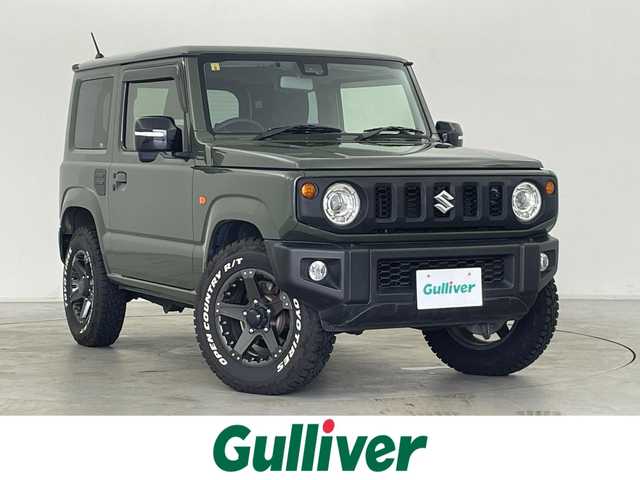 スズキ ジムニー XC 群馬県 2020(令2)年 5.1万km ジャングルグリーン rosso MODELLOマフラー/＝＝＝＝＝/4WD/5MT/7インチディスプレイオーディオ/・AM/FM/Bluetooth/AppleCarPlay/AndroidAuto/バックカメラ/前席シートヒーター/デュアルセンサーブレーキサポート/車線逸脱警報機能/ふらつき警報機能/誤発進抑制機能/ハイビームアシスト/先行車発進お知らせ機能/標識認識機能/ヒルディセントコントロール/TOYO OPEN COUNTRY ホワイトレタータイヤ(4本)/ETC/プッシュスタート/スマートキー/電動格納ミラー/ヘッドライトウォッシャー