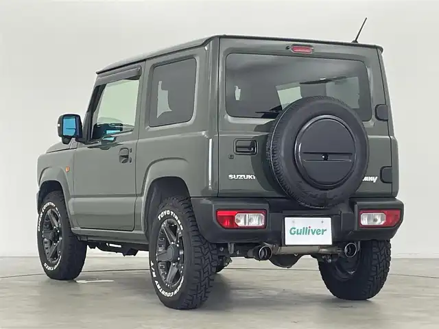 スズキ ジムニー XC 群馬県 2020(令2)年 5.1万km ジャングルグリーン rosso MODELLOマフラー/＝＝＝＝＝/4WD/5MT/7インチディスプレイオーディオ/・AM/FM/Bluetooth/AppleCarPlay/AndroidAuto/バックカメラ/前席シートヒーター/デュアルセンサーブレーキサポート/車線逸脱警報機能/ふらつき警報機能/誤発進抑制機能/ハイビームアシスト/先行車発進お知らせ機能/標識認識機能/ヒルディセントコントロール/TOYO OPEN COUNTRY ホワイトレタータイヤ(4本)/ETC/プッシュスタート/スマートキー/電動格納ミラー/ヘッドライトウォッシャー