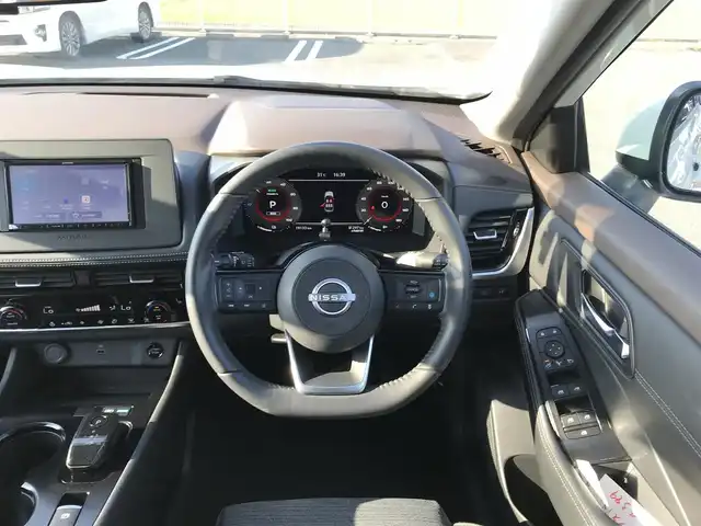 日産 エクストレイル X e－4ORCE 鳥取県 2023(令5)年 2万km ブリリアントホワイトパール ４・W・D　ターボ/社外ナビ/BT/CD/USB/バックカメラ・ETC/プロパイロット/エマージェンシーブレーキ/レーンキープアシスト/ブラインドスポットモニター/前後ドライブレコーダー/パワーバックドア/運転席パワーシート/前後席シートヒーター/LEDヘットライト/純正18インチアルミホイール/プッシュエンジンスタート/フロアマット