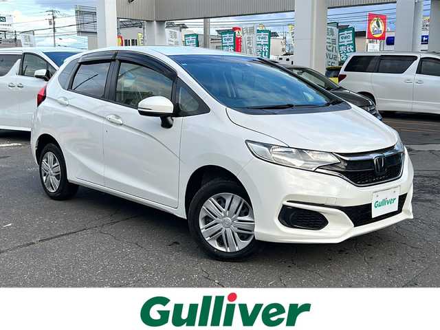 ホンダ フィット 13G F 道東・釧路十勝 2018(平30)年 7.2万km タフホワイトⅡ ４WD/ホンダセンシング/純正ナビ（VXM-185）/CD/DVD/MSV/BT/フルセグTV/バックカメラ/デアイサー/ミラーヒーター/バイザー/ETC