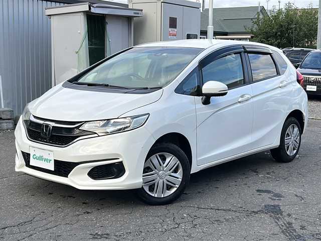 ホンダ フィット 13G F 道東・釧路十勝 2018(平30)年 7.2万km タフホワイトⅡ ４WD/ホンダセンシング/純正ナビ（VXM-185）/CD/DVD/MSV/BT/フルセグTV/バックカメラ/デアイサー/ミラーヒーター/バイザー/ETC