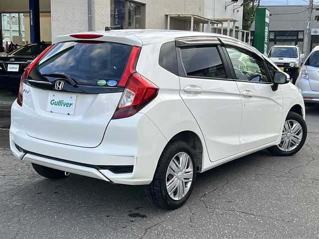 ホンダ フィット 13G F 道東・釧路十勝 2018(平30)年 7.2万km タフホワイトⅡ ４WD/ホンダセンシング/純正ナビ（VXM-185）/CD/DVD/MSV/BT/フルセグTV/バックカメラ/デアイサー/ミラーヒーター/バイザー/ETC