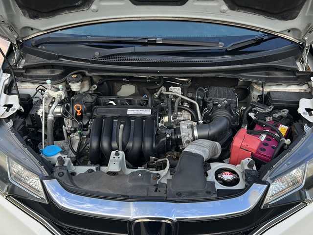 ホンダ フィット 13G F 道東・釧路十勝 2018(平30)年 7.2万km タフホワイトⅡ ４WD/ホンダセンシング/純正ナビ（VXM-185）/CD/DVD/MSV/BT/フルセグTV/バックカメラ/デアイサー/ミラーヒーター/バイザー/ETC