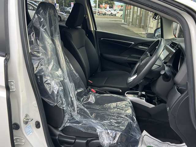 ホンダ フィット 13G F 道東・釧路十勝 2018(平30)年 7.2万km タフホワイトⅡ ４WD/ホンダセンシング/純正ナビ（VXM-185）/CD/DVD/MSV/BT/フルセグTV/バックカメラ/デアイサー/ミラーヒーター/バイザー/ETC
