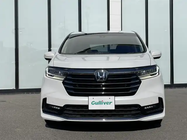ホンダ オデッセイ アブソルート EX 大阪府 2021(令3)年 6.9万km プラチナホワイトパール 純正１０インチプレミアムインターナビ　/   フルセグＴＶ/CD/DVD/Bluetooth/USB　/全方位モニター　/純正１１．６インチ後席モニター　/ブラインドスポットモニター/クリアランスソナー/前席シートヒーター　/両側パワースライドドア　/レーダークルーズコントロール/レーンキープアシスト/アイドリングストップ　/電動リアゲート　/前席パワーシート/前後ドライブレコーダー/オットマン/純正18インチアルミホイール/エンジンスターター/純正フロアマット/プッシュスタート/スマートキー/ビルトインＥＴＣ２．０　/ＬＥＤ