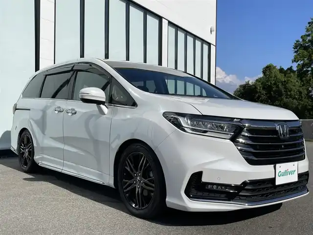 ホンダ オデッセイ アブソルート EX 大阪府 2021(令3)年 6.9万km プラチナホワイトパール 純正１０インチプレミアムインターナビ　/   フルセグＴＶ/CD/DVD/Bluetooth/USB　/全方位モニター　/純正１１．６インチ後席モニター　/ブラインドスポットモニター/クリアランスソナー/前席シートヒーター　/両側パワースライドドア　/レーダークルーズコントロール/レーンキープアシスト/アイドリングストップ　/電動リアゲート　/前席パワーシート/前後ドライブレコーダー/オットマン/純正18インチアルミホイール/エンジンスターター/純正フロアマット/プッシュスタート/スマートキー/ビルトインＥＴＣ２．０　/ＬＥＤ