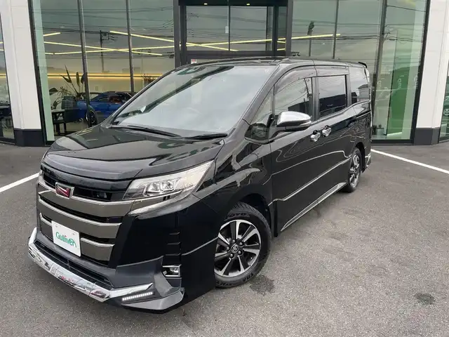 トヨタ ノア Si ダブルバイビーⅢ 栃木県 2020(令2)年 5.4万km ブラック ワンオーナー/TRDエアロ（F/S/R）/純正9インチナビ/バックカメラ/Bluetoothオーディオ/DVD再生機能/フルセグTV走行中視聴可/ステアリングリモコン/USB入力端子×2/純正12.1インチフリップダウンモニター/トヨタセーフティセンス/クルーズコントロール/クリアランスソナー /両側パワースライドドア /ハーフレザーシート/LEDヘッドライト/シーケンシャルウインカー/スマートキー×2