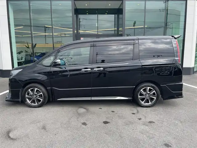 トヨタ ノア Si ダブルバイビーⅢ 栃木県 2020(令2)年 5.4万km ブラック ワンオーナー/TRDエアロ（F/S/R）/純正9インチナビ/バックカメラ/Bluetoothオーディオ/DVD再生機能/フルセグTV走行中視聴可/ステアリングリモコン/USB入力端子×2/純正12.1インチフリップダウンモニター/トヨタセーフティセンス/クルーズコントロール/クリアランスソナー /両側パワースライドドア /ハーフレザーシート/LEDヘッドライト/シーケンシャルウインカー/スマートキー×2