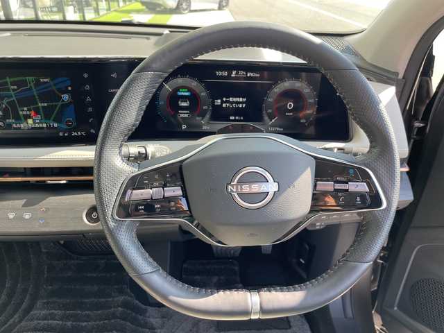 日産 アリア B6 愛知県 2023(令5)年 1.3万km ダークメタルグレー プロパイロット2.0/純正12.4型ディスプレイオーディオナビ/全方位カメラ/レーダークルーズコントロール/シートヒーター/バックカメラ/電動リアゲート/パワーシート/ヘッドアップディスプレイ/コーナーセンサー/ETC2.0/純正アルミホイール/ブラインドスポットモニター/LEDヘッドライト/ステアリングヒーター/インテリジェントミラー/オートマチックハイビーム/衝突軽減システム/フルセグ/Bluetooth/ドライブレコーダー/ステアリングスイッチ/スマートキー/プッシュスタート