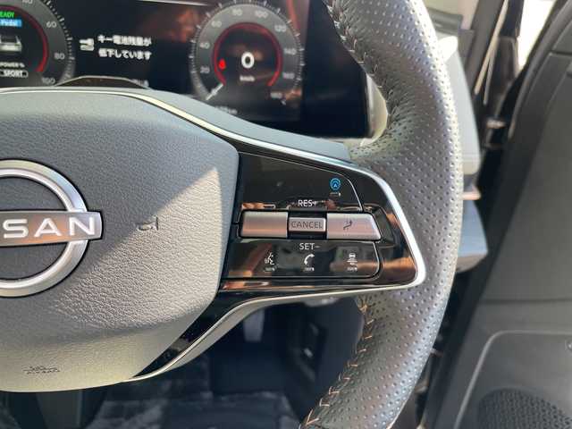 日産 アリア B6 愛知県 2023(令5)年 1.3万km ダークメタルグレー プロパイロット2.0/純正12.4型ディスプレイオーディオナビ/全方位カメラ/レーダークルーズコントロール/シートヒーター/バックカメラ/電動リアゲート/パワーシート/ヘッドアップディスプレイ/コーナーセンサー/ETC2.0/純正アルミホイール/ブラインドスポットモニター/LEDヘッドライト/ステアリングヒーター/インテリジェントミラー/オートマチックハイビーム/衝突軽減システム/フルセグ/Bluetooth/ドライブレコーダー/ステアリングスイッチ/スマートキー/プッシュスタート