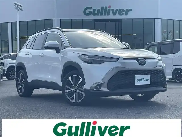 トヨタ カローラ クロス ハイブリッド Z 島根県 2022(令4)年 3万km プラチナホワイトパールマイカ 登録時走行距離29583km/保証書/取扱説明書/純正９インチナビ（フルセグTV・Bluetooth・FM・AM）/前後ドライブレコーダー/前後コーナーセンサー/全周囲カメラ/パワーシート（運転席）/前席シートヒーター/ステアリングヒーター/電動リアゲート/衝突被害軽減システム/純正１８インチAW/ETC