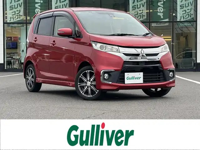 三菱 ｅＫカスタム T　セーフティPKG 岡山県 2016(平28)年 7.1万km レッドメタリック 登録時走行距離70715km/社外7V型ワイドナビ/ワンセグTV/（AM.FM.TV.BT.DVD.）/アラウンドビューモニター付ルームミラー/バックカメラ/ETC/衝突被害軽減ブレーキ/前後ドライブレコーダー/横滑り防止装置/D席ヒートシーター/オートライト/キセノンライト/15インチ純正AW/アイドリングストップ/純正フロアマット