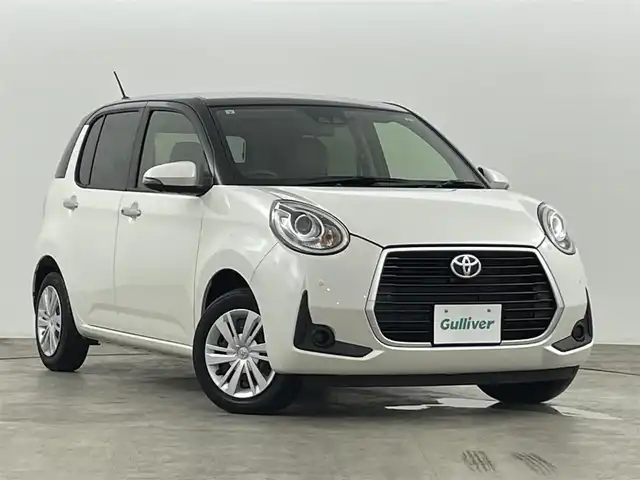 トヨタ パッソ モーダ　チャーム 福島県 2021(令3)年 0.5万km ブラックマイカメタリック/パールホワイト2トーン スマートアシスト /・衝突警報機能 /・衝突回避支援ブレーキ /・機能車線逸脱警報機能 /・先行車発進お知らせ機能/・発進抑制機能/純正ナビゲーション /型式：NSCN-W68/・Bluetooth/ワンセグTV/CD/AM・FM/AUX/・バックカメラ/ETC /ドライブレコーダー /シートヒーター/LEDライト/・フォグライト/・オートライト/・オートマチックハイビーム/プッシュスタート/・スマートキー/純正フロアマット/ドアバイザー