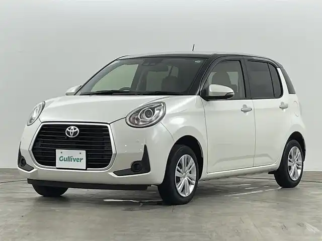トヨタ パッソ モーダ　チャーム 福島県 2021(令3)年 0.5万km ブラックマイカメタリック/パールホワイト2トーン スマートアシスト /・衝突警報機能 /・衝突回避支援ブレーキ /・機能車線逸脱警報機能 /・先行車発進お知らせ機能/・発進抑制機能/純正ナビゲーション /型式：NSCN-W68/・Bluetooth/ワンセグTV/CD/AM・FM/AUX/・バックカメラ/ETC /ドライブレコーダー /シートヒーター/LEDライト/・フォグライト/・オートライト/・オートマチックハイビーム/プッシュスタート/・スマートキー/純正フロアマット/ドアバイザー