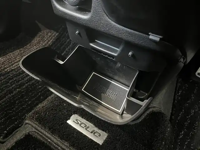 スズキ ソリオ HV MZ 大阪府 2023(令5)年 3.1万km ピュアホワイトP スズキセーフティサポート/　・衝突被害軽減ブレーキ/　・車線逸脱警報/　・道路標識認識機能/　・前後呉発進抑制機能/社外メモリナビ/　TV/FM/AM/Bluetooth/フルセグ/両側パワースライドドア/アダプティブクルーズコントロール/LEDヘッドライト(オートライト・フォグランプ)/シートヒーター（運転席・助手席）/純正１５インチアルミホイール/ヘッドアップディスプレイ/コーナーセンサー(後方)/アイドリングストップ/格納電動ウィンカーミラー/プッシュスタート/ETC/ドアバイザー/ビークルダイナミクスコントロール