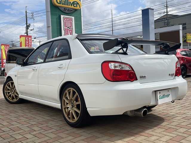 スバル インプレッサ ＷＲＸ STi スペックC 鳥取県 2002(平14)年 1.5万km ピュアホワイト ワンオーナー/低走行車両/純正17インチBBS/純正ブレンボキャリパー/純正GTウイング/純正ST-Iタワーバー/C-DIFFコントローラー/DCCDコントローラー/I/Cスプレー/ルーフベンチレーター/社外車高調サスペンション/社外ターボタイマー/D席ブリッド製シート/社外６点ロールバー/記録簿R5R3H31H27H25H24H23/保証書・取説