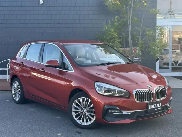 ＢＭＷ ２１８ｉ アクティブツアラー ラグジュアリー 滋賀県 2020(令2)年 0.9万km サンセットオレンジ 純正ナビ/バックカメラ/パークディスタンスコントロール/ミラー一体型ETC/パワーバックドア/アダプティブクルーズコントロール/インテリジェントセーフティー/白レザーシート/パワーシート/シートヒーター/HUD/LEDヘッドライト