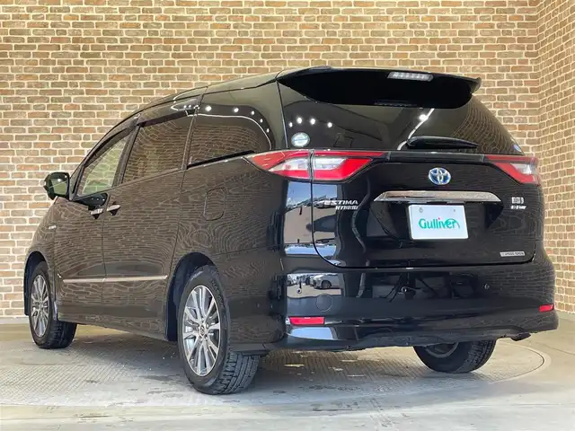 トヨタ エスティマ ハイブリッド アエラス プレミアム G 岩手県 2019(令1)年 9.4万km ブラック ４WD/電動格納サードシート/両側パワースライドドア/パワーバックドア/トヨタセーフティセンスC/プリクラッシュセーフティ/レーンディパーチャーアラート/オートマチックハイビーム/クリアランスソナー/横滑り防止装置/クルーズコントロール/AC100V1500Wアクセサリーコンセント/パワーシート/シートヒーター/オットマン/リアオートエアコン/純正10インチナビ/（CD/DVD/フルセグ/SD/Bluetooth）/バックカメラ/ドライブレコーダー/ETC/LEDヘッドランプ/純正17インチアルミホイール