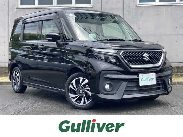 スズキ ソリオ バンディット HV MV 静岡県 2021(令3)年 4.5万km スーパーブラックパール スズキセーフティサポート/純正8インチメモリーナビ（CN-RZ865）/  AM FM CD DVD Bluetooth iPod/フルセグTV/バックモニター/ETC/両側パワースライドドア/前後ドライブレコーダー/アダプティブクルーズコントロール/LEDオートヘッドライト/フロントフォグランプ/カラーヘッドアップディズプレイ/ステアリングスイッチ/リアロールサンシェード/シートバックテーブル/充電用USB端子×2/純正15インチアルミホイール/純正フロアマット/スマートキー×2本