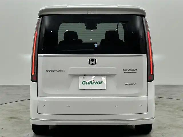 ホンダ ステップワゴン スパーダ eHEV プレミアムライン 福岡県 2023(令5)年 0.4万km プラチナホワイトパール 純正ナビ　/バックカメラ　/ＡＣＣ　/コーナーセンサー　/衝突被害軽減ブレーキ　/レーンキープ　/踏み間違い防止　/ＢＳＭ　/パドルシフト　/両側電動スライドドア　/ハーフレザー　/シートヒーター　/パワーリアゲート　/ＬＥＤ