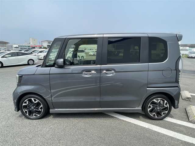 ホンダ Ｎ ＢＯＸ G L ターボ ホンダセンシング 熊本県 2018(平30)年 10.1万km シャイニンググレーM (株)IDOMが運営する【じしゃロン熊本店】の自社ローン専用車両になりますこちらは現金またはオートローンご利用時の価格です。自社ローンご希望の方は別途その旨お申付け下さい　/純正8インチSDナビ【VXU-207NBi】/　（フルセグTV・Bluetooth・DVD・AM/FM）/バックカメラ/前後ドライブレコーダー/ビルトインＥＴＣ/ステアリングスイッチ/クルーズコントロール/コーナーセンサー/衝突軽減ブレーキ/横滑り防止装置/レーンアシスト/オートライト/両側パワースライドドア/パドルシフト/電動格納ウィンカーミラー/ドアバイザー/ISOFIX/カーテンエアバック/純正フロアマット/純正LEDヘッドライト/純正15インチアルミホイール