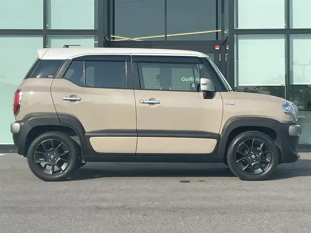 スズキ クロスビー HYBRID MZ 愛媛県 2019(平31)年 4.4万km キャラバンアイボリーパールメタリック/ホワイト 2トーンルーフ 社外8型メモリナビ/CD/DVD/BT/MSV/iPod/DTV/HDMI/バックカメラ/ETC/ドライブレコーダー/パドルシフト/革巻きステアリング/ステアリングスイッチ/D＋N席シートヒーター/LEDヘッドライト/オートライト/フォグランプ/コーナーセンサー/衝突被害軽減ブレーキ/純正16インチアルミホイール/純正フロアマット/電動格納ウィンカーミラー/プッシュスタート/スマートキー