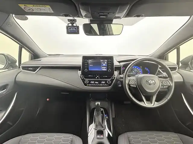 トヨタ カローラ スポーツ ハイブリッドG Z 岡山県 2021(令3)年 1万km アティチュードブラックマイカ/プラチナホワイトパールマイカ 純正ディスプレイオーディオ/(USB/BT/Mira Cast)/バックモニター/ビルトインETC/社外ドライブレコーダー前後/前席シートヒーター/衝突軽減ブレーキ/レーダークルーズコントロール/レーンキープアシスト/オートハイビーム/LEDオートヘッドライト/ヘッドアップディスプレイ/ブラインドスポットモニター/ミラーヒーター/純正フロアマット/純正18インチAAW